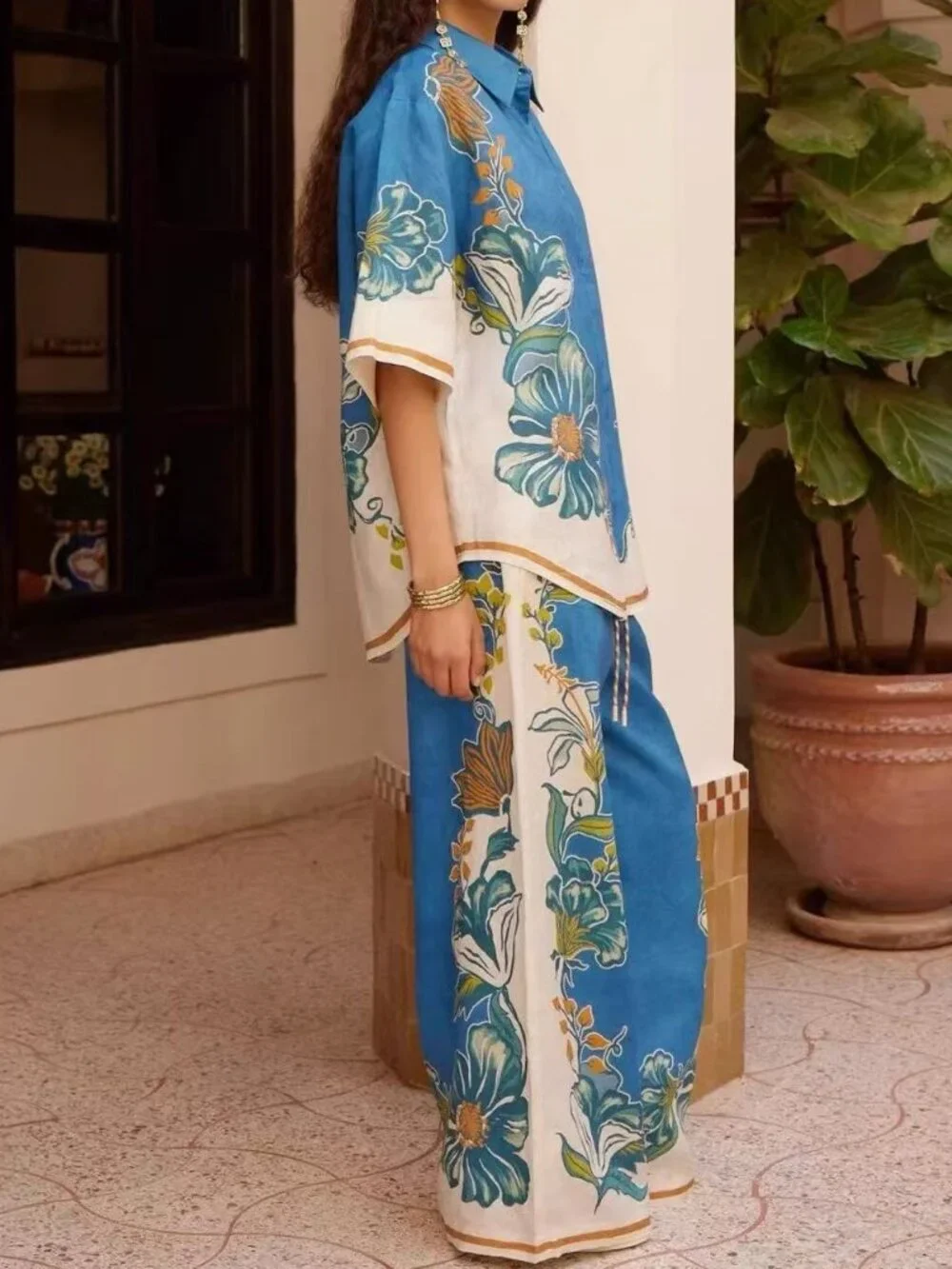 Zimmermann Blue and white shirt two-piece set.
